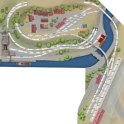 Gleisplan Leben am Fluss mit 2 Bahnhöfen, Industrie und Stadt